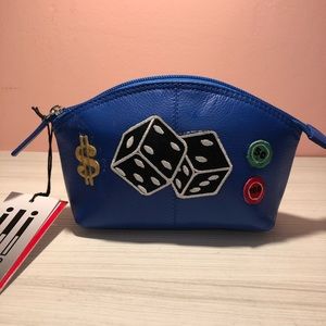 NWT blue leather makeup bag with casino patches!
